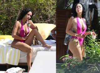 Draya Michele in a pink swimsuit in Miami.