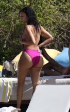 Draya Michele in a pink swimsuit in Miami.