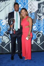 SAN FRANCISCO, CA - FEBRUARY 05: Tampa Bay Buccaneers quarterback Jameis Winston (L), recipient of the 2015 Pepsi Rookie of the Year Award, and Breion Allen pose on the Blue Carpet at the 2015 Pepsi Rookie of the Year Award Ceremony at Pepsi Super Friday Night at Pier 70 on February 5, 2016 in San Francisco, California.