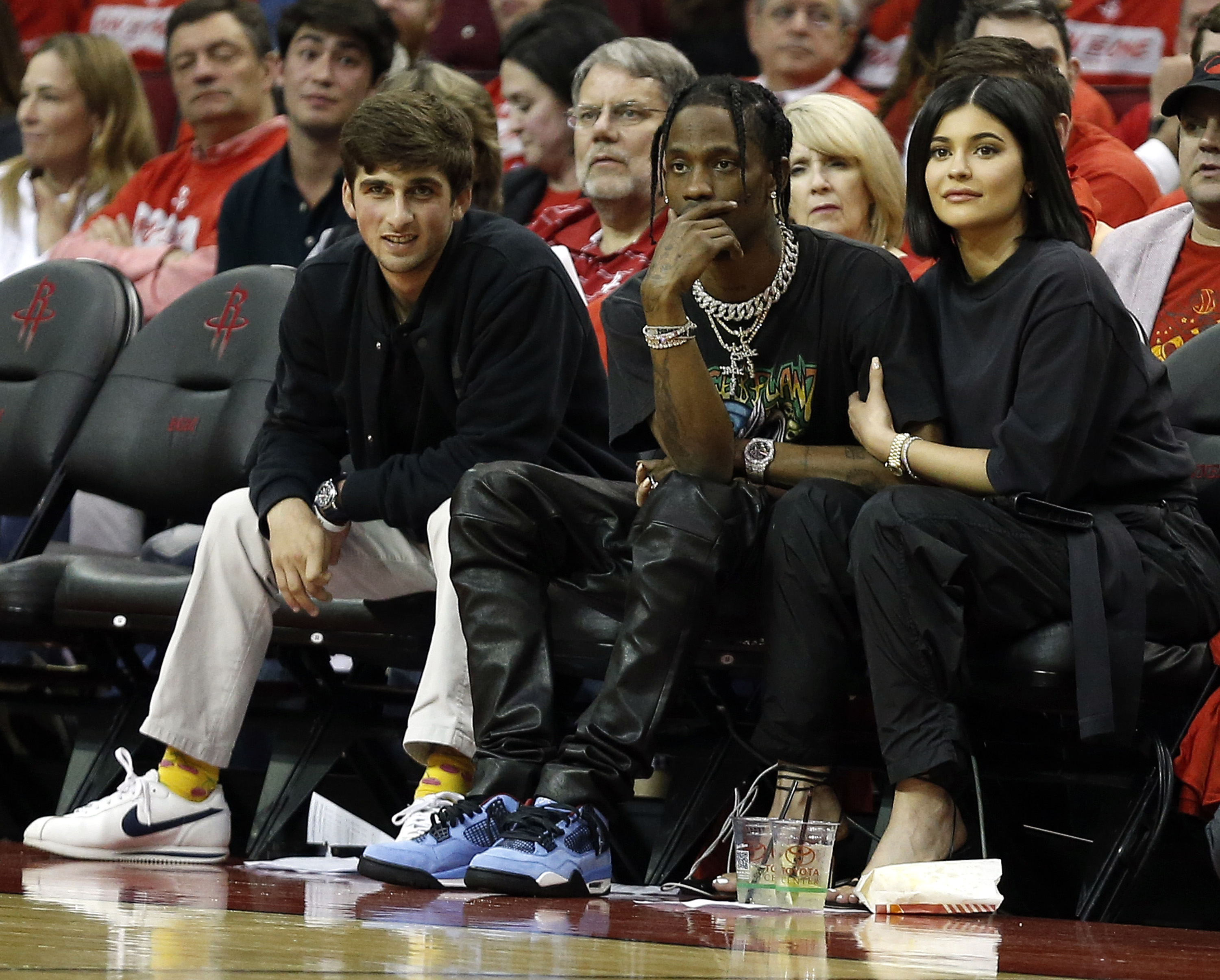 HOUSTON, TX - APRIL 18: Travis Scott and Kylie Jenner sit court-side during Game Two of the first round of the Western Conference playoffs at Toyota Center on April 18, 2018 in Houston, Texas.
