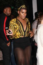 EJ Johnson wears a Versace shirt as he is seen exiting the Poppy club after a night of partying in West Hollywood