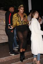 EJ Johnson wears a Versace shirt as he is seen exiting the Poppy club after a night of partying in West Hollywood