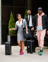 Gabrielle Union and Duane Wade check out of their hotel in New York