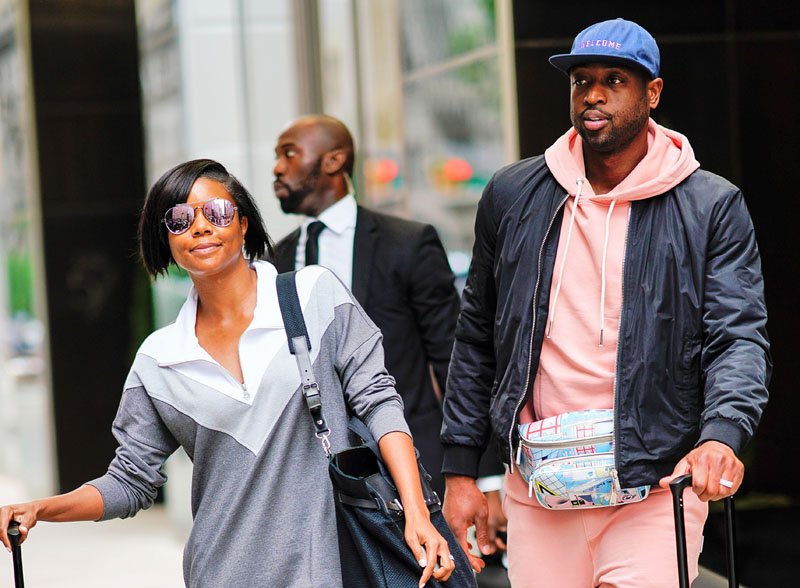 Gabrielle Union and Duane Wade check out of their hotel in New York