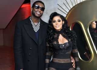 NEW YORK, NY - JANUARY 25: Gucci Mane (L) and Keyshia Ka'Oir attend the Warner Music Group Pre-Grammy Party in association with V Magazine on January 25, 2018 in New York City.