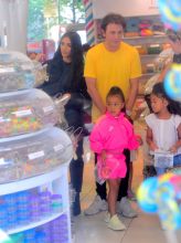 Kim Kardashian was spotted out in NYC on Thursday, as she celebrated her daughter's 5th Birthday. She was joined by BFF Jonathan Cheban as they headed to Dylan's Candy Bar for a Sweet Shopping Spree, as well as a make your own Ice Cream Shop, called Cool Mess. North looked pretty in a pink adidas tracksuit as Kim wore a black jacket and knee high boots. Cheban aka FoodGod showed them some special candies inside the store.