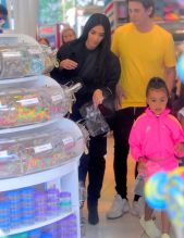 Kim Kardashian was spotted out in NYC on Thursday, as she celebrated her daughter's 5th Birthday. She was joined by BFF Jonathan Cheban as they headed to Dylan's Candy Bar for a Sweet Shopping Spree, as well as a make your own Ice Cream Shop, called Cool Mess. North looked pretty in a pink adidas tracksuit as Kim wore a black jacket and knee high boots. Cheban aka FoodGod showed them some special candies inside the store.