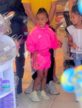 Kim Kardashian was spotted out in NYC on Thursday, as she celebrated her daughter's 5th Birthday. She was joined by BFF Jonathan Cheban as they headed to Dylan's Candy Bar for a Sweet Shopping Spree, as well as a make your own Ice Cream Shop, called Cool Mess. North looked pretty in a pink adidas tracksuit as Kim wore a black jacket and knee high boots. Cheban aka FoodGod showed them some special candies inside the store.
