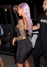 Amber Rose shows off her new Purple hair Style in a LBD as she was seen leaving 'Ace of Diamonds' strip club in West Hollywood, CA