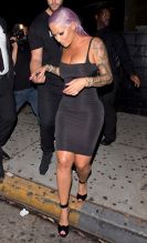 Amber Rose shows off her new Purple hair Style in a LBD as she was seen leaving 'Ace of Diamonds' strip club in West Hollywood, CA
