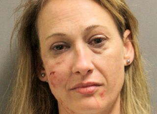A Texas woman was arrested after allegedly biting off and swallowing her victim's nose. Jessica Collins, 41, was arrested in Conroe, Texas, and charged with assault. Police say Collins attacked the woman when she told her to leave her home after a night out at a bar. Collins is then accused of biting off a large chunk of the 28-year-old woman's nose and swallowing it.