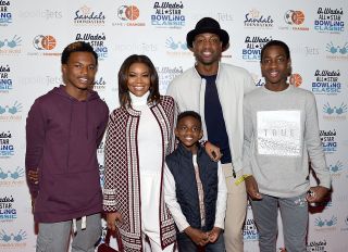 TORONTO, ON - FEBRUARY 13: Dahveon Morris, Gabrielle Union, Zion Wade, Dwyane Wade, and Zaire Wade attend the DWade All Star Bowling Classic Benefitting The Sandals Foundation And Wade's World Foundation at The Ballroom on February 13, 2016 in Toronto, Canada.