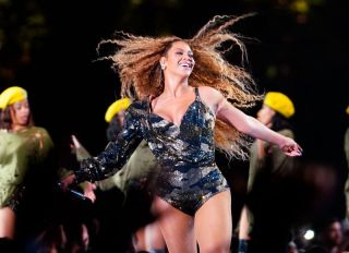 Beyonce whips her hair back and forth during her performance at the 2018 Coachella Music Festival in Indio, CA