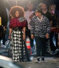 Janet Jackson was spotted on set of a New Music Video in Brooklyn on Thursday evening in New York, NY, USA. She filmed an exterior scene with Daddy Yankee, where they danced in the streets, as their music played. Janet wore a Big Puffy afro, and a plaid ensemble for this scene.
