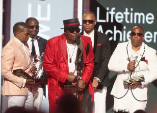LOS ANGELES, CA - JUNE 25: (L-R) Ricky Bell, Johnny Gill, Bobby Brown and of New Edition accept the Lifetime Achievement Award onstage at 2017 BET Awards at Microsoft Theater on June 25, 2017 in Los Angeles, California.