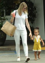 Australian Model Paige Butcher, girlfriend of Eddie Murphy and their daughter Izzy are spotted as they grab a drink while out shopping in Beverly Hills, ca