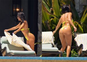 Kourtney Kardashian beach Mexico bright yellow bikini