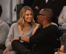 Eddie Murphy and Paige Butcher out at the Lakers game. Jazz 112 Lakers 97 Staples Center LA CA 4/8/18