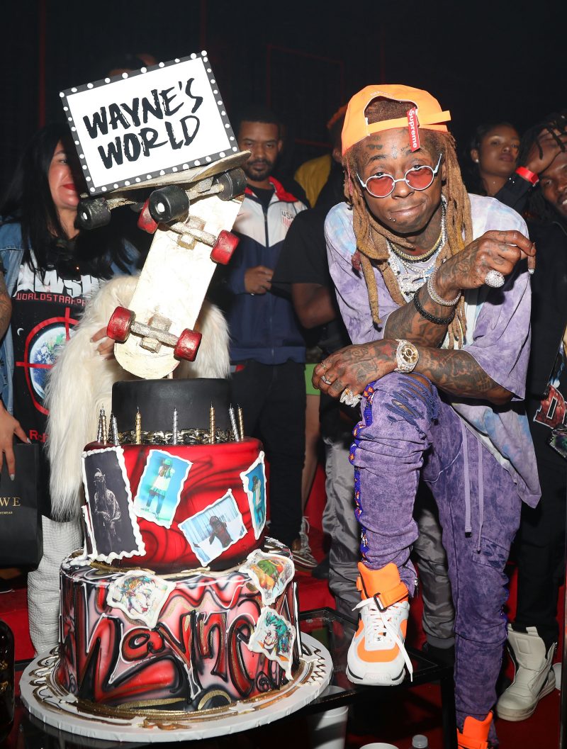 LOS ANGELES, CA - SEPTEMBER 28: Lil Wayne stands next to his birthday cake at his 36th birthday party and Carter V release at HUBBLE on September 28, 2018 in Los Angeles, California. 
