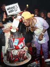 LOS ANGELES, CA - SEPTEMBER 28: Lil Wayne blows out the candles on his birthday cake at his 36th birthday party and Carter V release at HUBBLE on September 28, 2018 in Los Angeles, California.