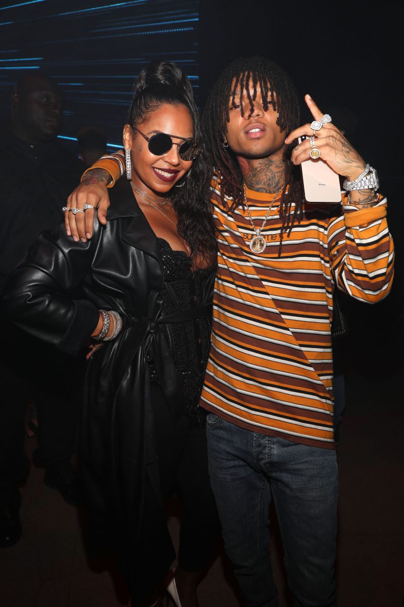 LOS ANGELES, CA - SEPTEMBER 27: Singer Ashanti (L) and rapper Swae Lee attend Lil Wayne's 36th birthday party and Carter V release at HUBBLE on September 27, 2018 in Los Angeles, California. 