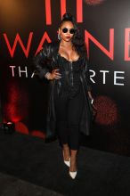 LOS ANGELES, CA - SEPTEMBER 27: Singer Ashanti attends Lil Wayne's 36th birthday party and Carter V release at HUBBLE on September 27, 2018 in Los Angeles, California.