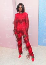 Duckie Thot Red Fringed Jumpsuit Rihanna's 4th Annual Diamond Ball Benefitting The Clara Lionel Foundation held at Cipriani Wall Street on September 13, 2018 in Manhattan, New York City, New York