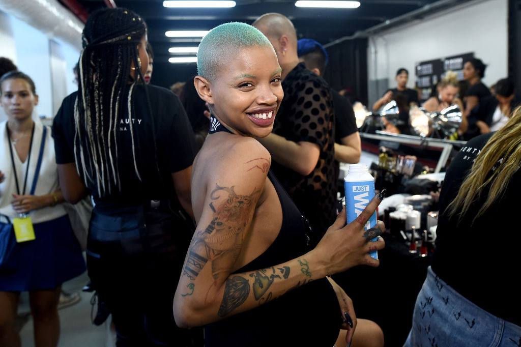 BROOKLYN, NY - SEPTEMBER 12: Model Slick Woods poses backstage for the Savage X Fenty Fall/Winter 2018 fashion show during NYFW at the Brooklyn Navy Yard on September 12, 2018 in Brooklyn, NY.