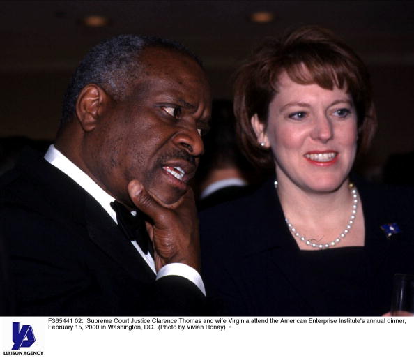 F365441 02: Supreme Court Justice Clarence Thomas and wife Virginia attend the American Enterprise Institute's annual dinner, February 15, 2000 in Washington, DC. 