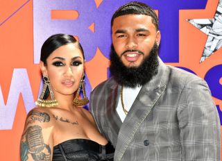 LOS ANGELES, CA - JUNE 24: Queen Naija (L) and ClarenceNYC attend the 2018 BET Awards at Microsoft Theater on June 24, 2018 in Los Angeles, California.