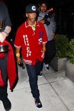 Katt Williams holds a trophy in hand as he leaves the Peppermint Club after attending Dave Chappelle's private event in Los Angeles, CA.