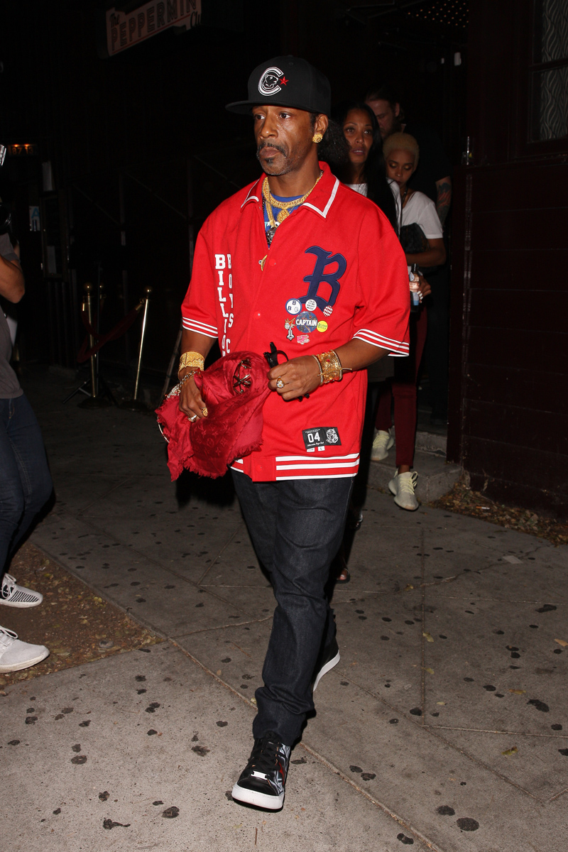 Katt Williams holds a trophy in hand as he leaves the Peppermint Club after attending Dave Chappelle's private event in Los Angeles, CA.