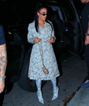 Kim Kardashian arrives to poppy event in money coat in Los Angeles, CA