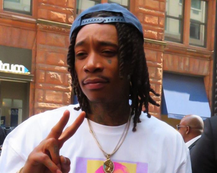 Wiz Khalifa does Bashs hair for school.
