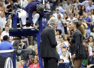 Tennis player Serena Williams talks to Umpire Carlos Ramos on his call of coaching against Williams at the 2018 U.S. Open in New York, NY. Afterwards, Williams pleaded her case to US Open officials Brian Earley, Tournament Referee and Donna Kelso, WTA Supervisor.