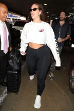 Ashley Graham is all smiles as she arrives at the Los Angeles International Airport in Los Angeles, CA
