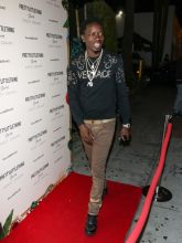 Michael Blackson Celebrities, including Ashley Graham in a green animal print dress, are seen attending the 'PrettyLittleThing x Ashley Graham' collaboration event at Delilah Nightclub in Los Angeles, CA.