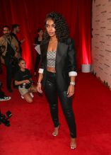 Lori Harvey Celebrities, including Ashley Graham in a green animal print dress, are seen attending the 'PrettyLittleThing x Ashley Graham' collaboration event at Delilah Nightclub in Los Angeles, CA.