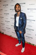 Miguel Celebrities, including Ashley Graham in a green animal print dress, are seen attending the 'PrettyLittleThing x Ashley Graham' collaboration event at Delilah Nightclub in Los Angeles, CA.