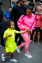 Kim Kardashian neon outfit children, North, Chicago and Saint West, in New York City, NY.