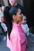 Kim Kardashian goes out in Soho with her daughter's, Chicago and North West, and her son Saint West in New York City, NY.