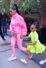 Kim Kardashian goes out in Soho with her daughter's, Chicago and North West, and her son Saint West in New York City, NY.