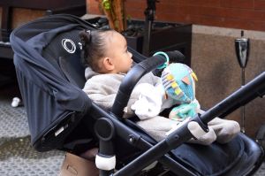 Saint West seen dancing outside the Mercer hotel while out with Chicago West and their nanny in SOHO NYC