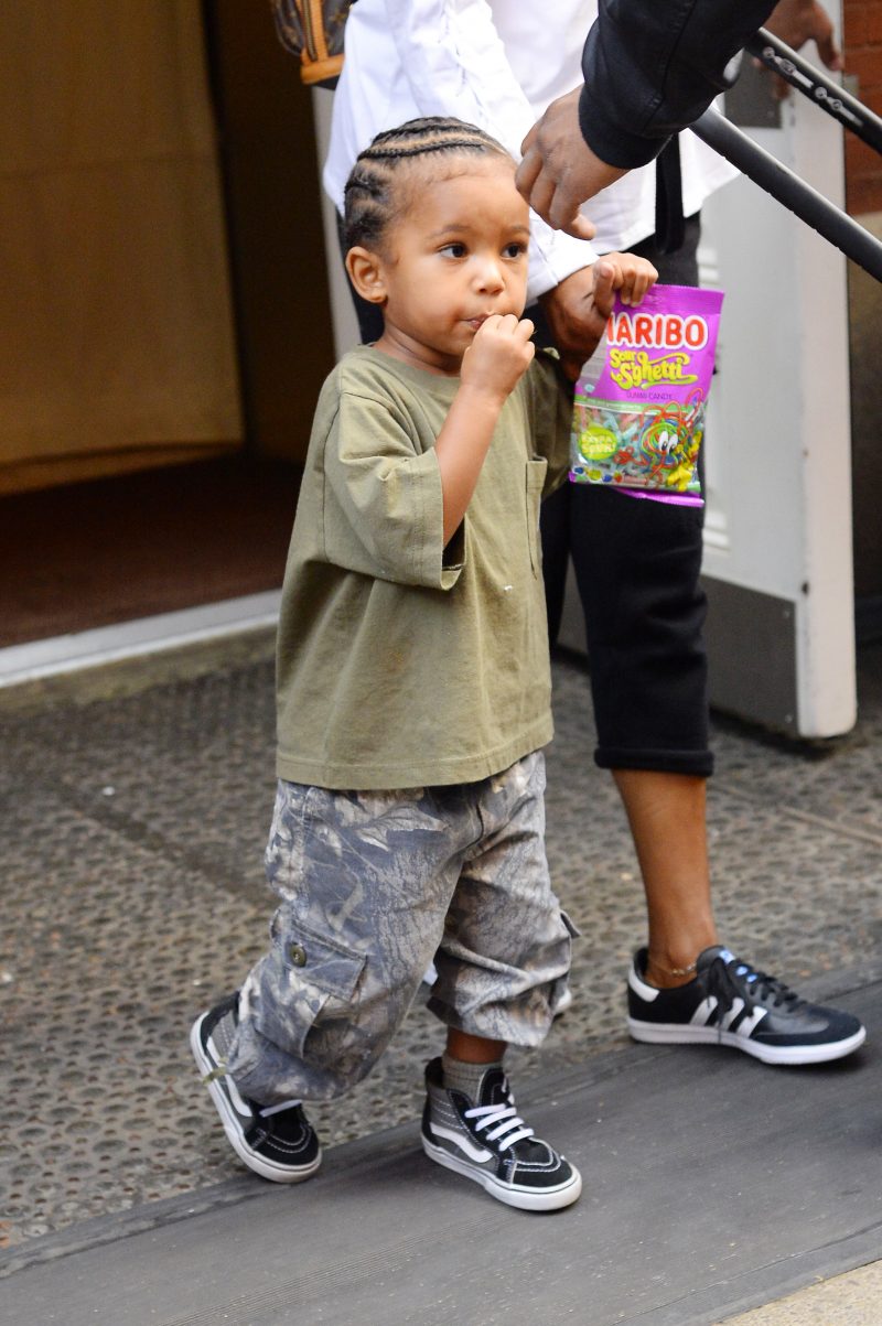 Saint West seen eating gummy candy while out with his nanny in SOHO NYC