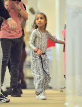 Kim Kardashian and Kourtney Kardashian go shopping at Jeffries with North West while they film scenes for 'Keeping Up With The Kardashians' in New York, NY.