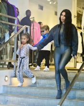 Kim Kardashian and Kourtney Kardashian go shopping at Jeffries with North West while they film scenes for 'Keeping Up With The Kardashians' in New York, NY.