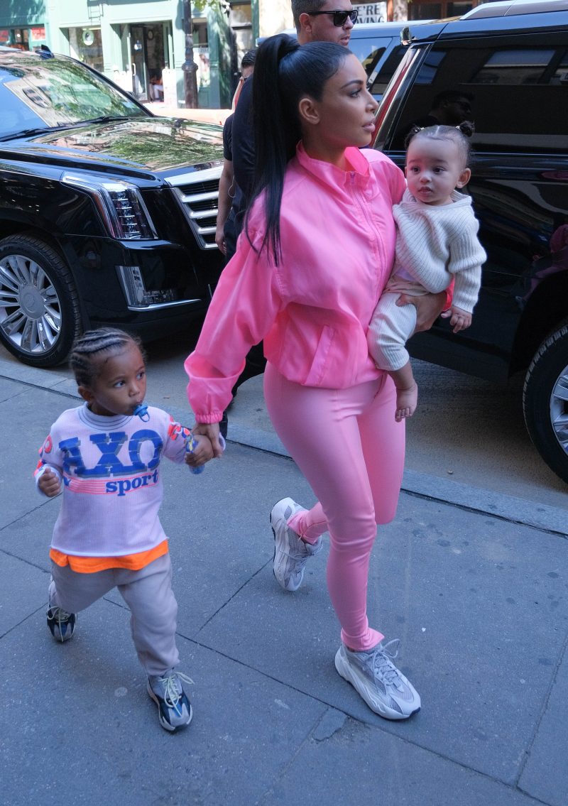 Kim Kardashian family New York City. North West, Saint West Chicago West, neon outfits