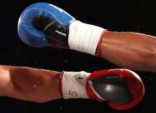 boxer threw hands at own trainer