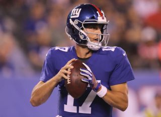 EAST RUTHERFORD, NJ - AUGUST 09: Kyle Lauletta #17 of the New York Giants looks to pass in the fourth quarter against the Cleveland Browns during their preseason game on August 9,2018 at MetLife Stadium in East Rutherford, New Jersey.