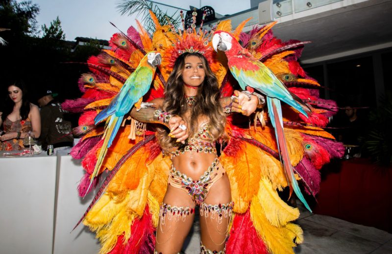 Asiah Collins wears carnival caribana costume for 30th birthday
